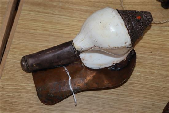 A Tibetan mounted conch shell